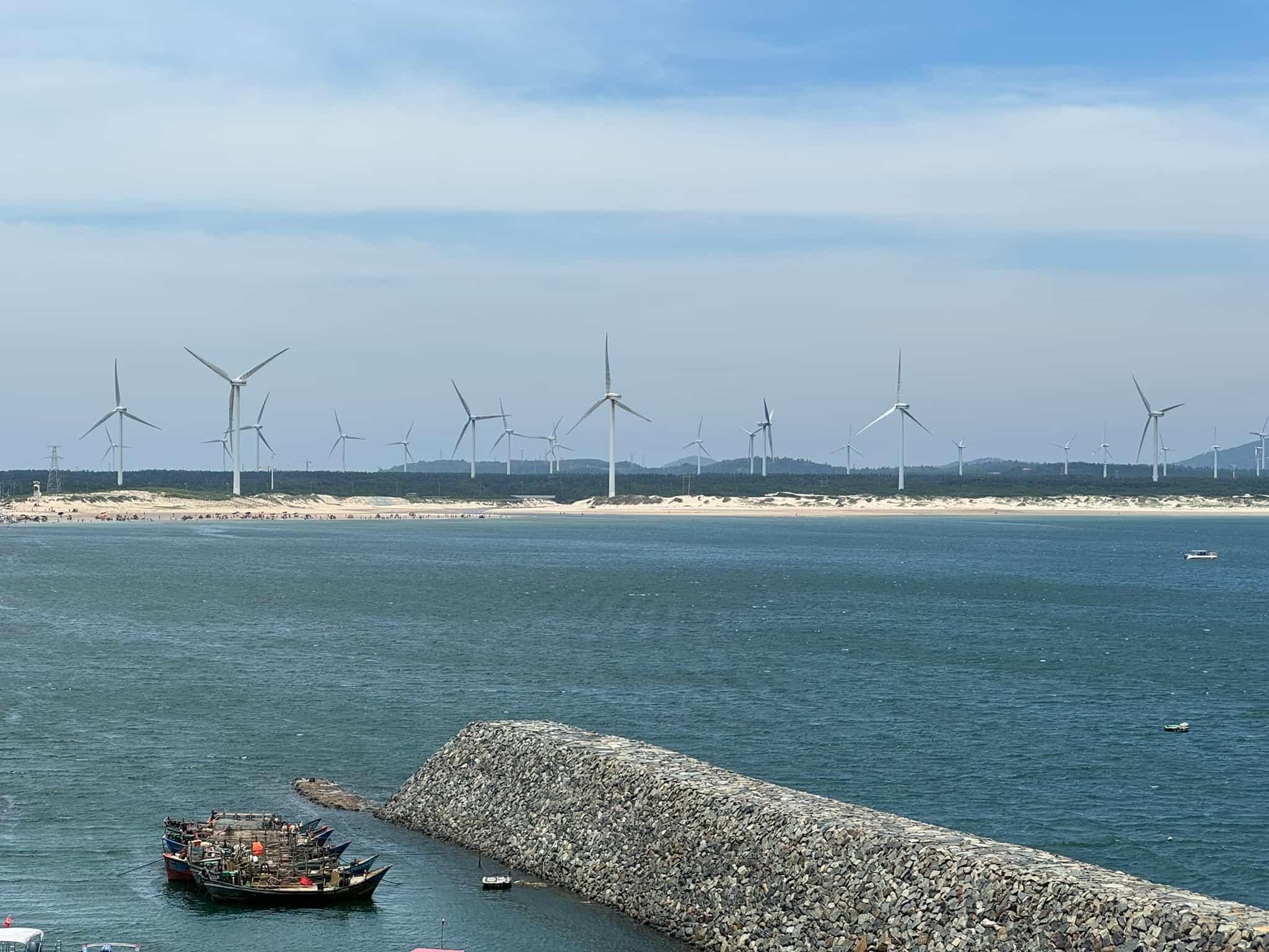 Tourists by the wind farm